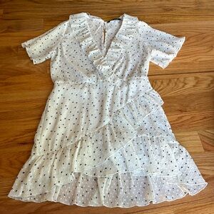 EUC Zara polka dot romper with ruffled bottom and low cut top sz M